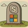 Ein Grabstein mit den Logos von Skype und Windows
